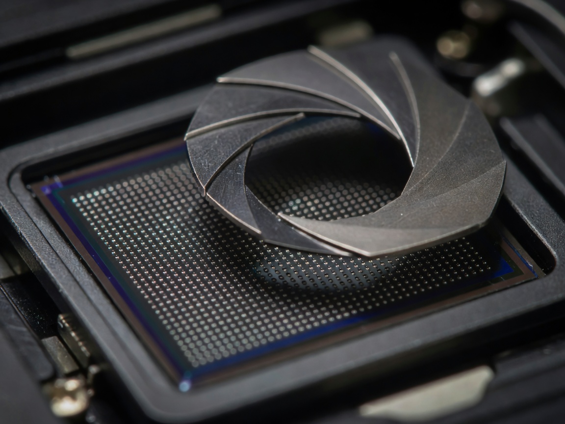 Macro view of physical camera sensor and variable mechanical aperture blades